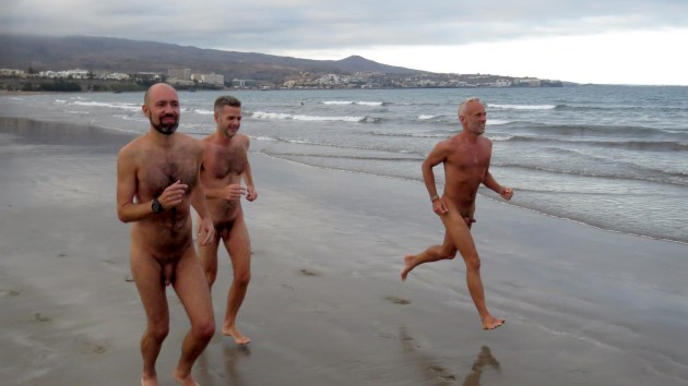 3 Naked runners start off on a 4k sunset run